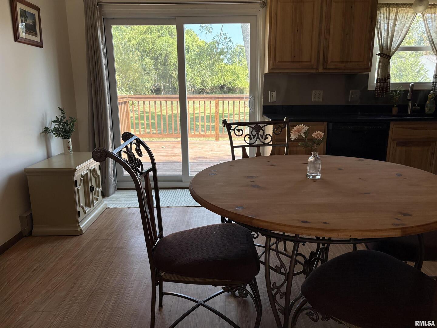 100 North 35th Street Herrin, IL 62948 - Photo 18 of 35 a view of a dining room with furniture and wooden floor