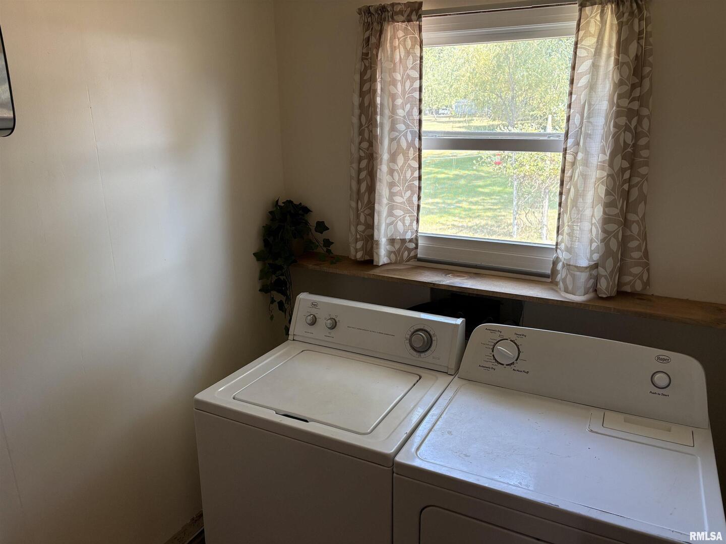 100 North 35th Street Herrin, IL 62948 - Photo 27 of 35 a utility room with dryer and window