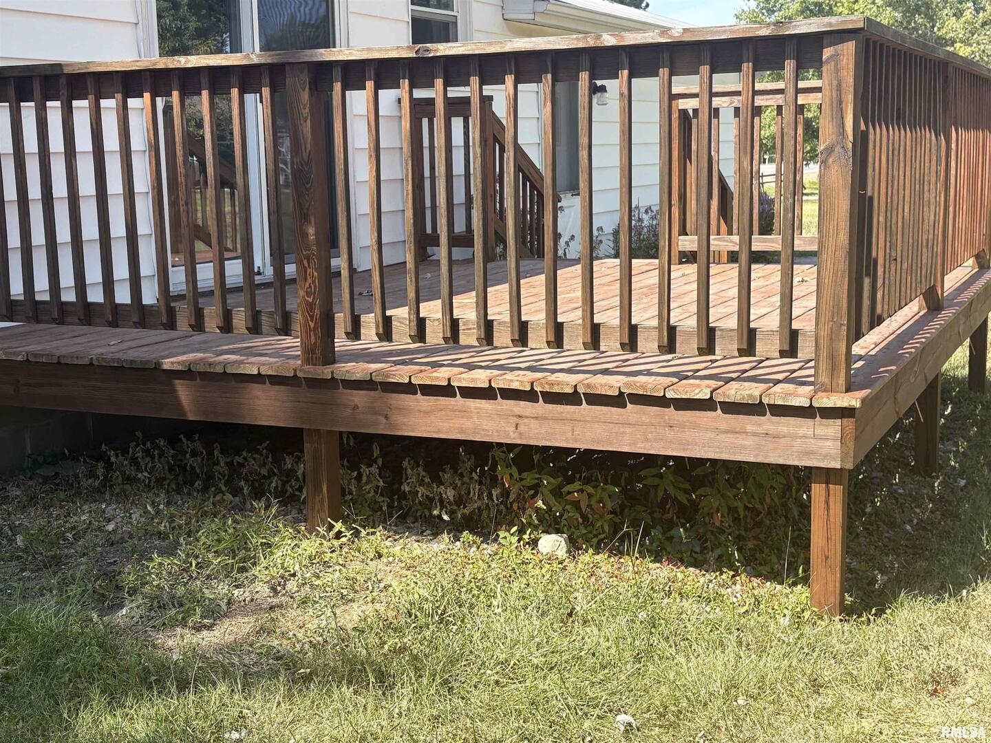 100 North 35th Street Herrin, IL 62948 - Photo 29 of 35 a view of a small yard and wooden fence