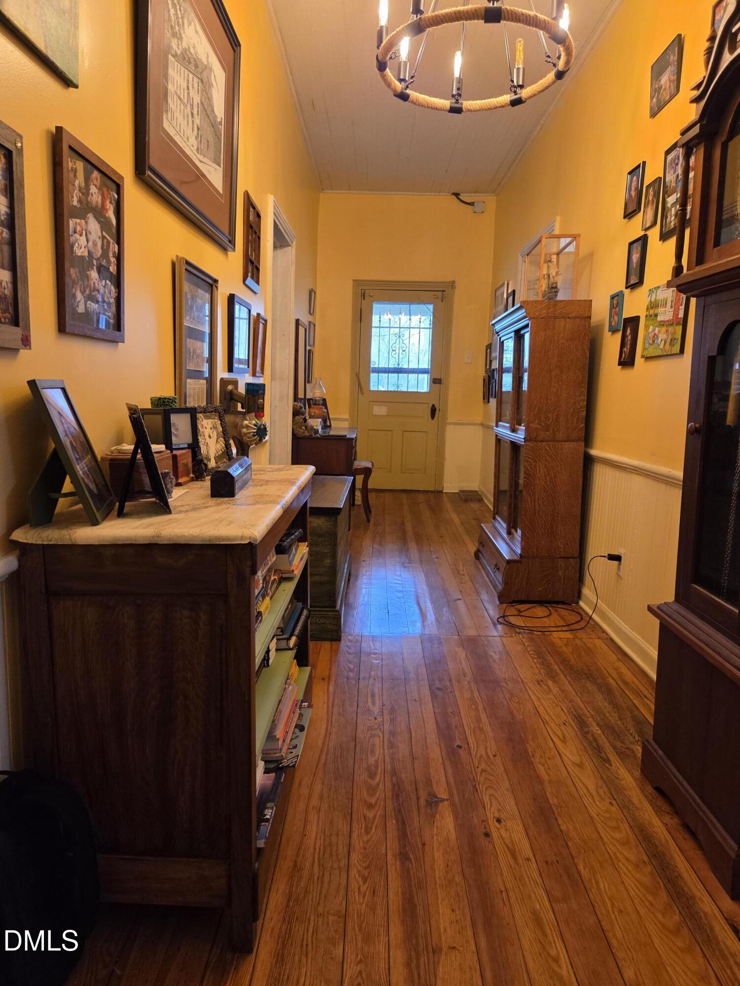 812 West Anderson Street Selma, NC 27576 - Photo 11 of 20 a view of a workspace with furniture and wooden floor
