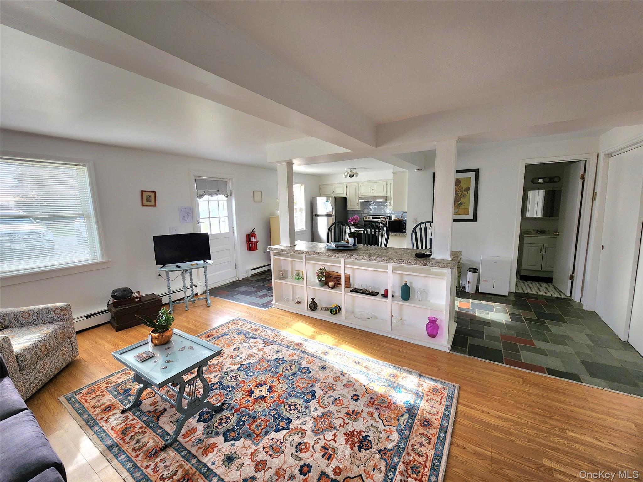 12 Traver Road Staatsburg, NY 12580 - Photo 11 of 11 a living room with furniture and a wooden floor