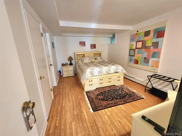 a bathroom with a toilet a sink and a shower