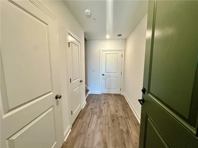 a view of hallway with stairs