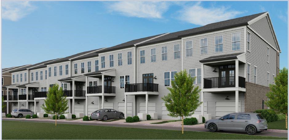 530 Alice Way, Unit D7 Cumming, GA 30040 - Photo 27 of 56 front view of a building with a yard