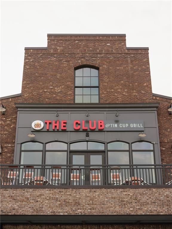 530 Alice Way, Unit D7 Cumming, GA 30040 - Photo 55 of 56 a sign that is on the wall