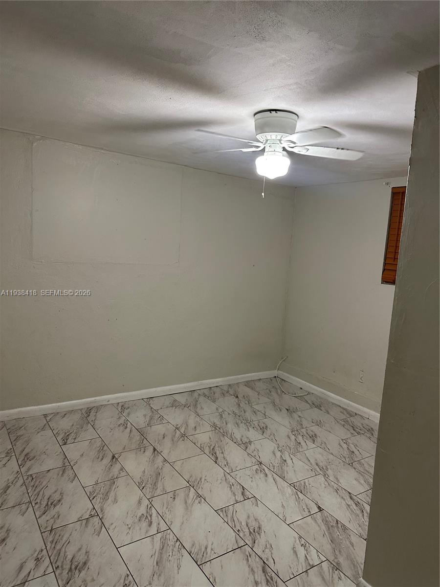 465 Northeast 157th Terrace, Unit 2 Miami, FL 33162 - Photo 9 of 9 a view of empty room