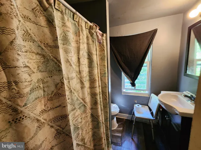 a view of a balcony with chairs