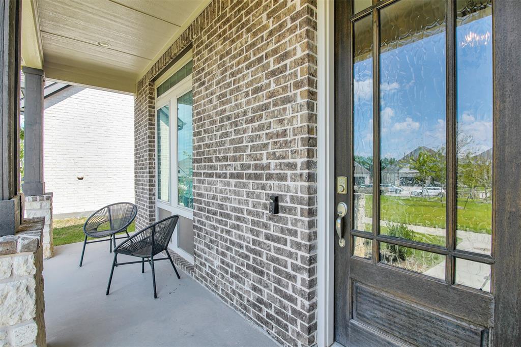 1026 Billy Lane Allen, TX 75013 - Photo 3 of 32 a view of balcony with two chairs and a table