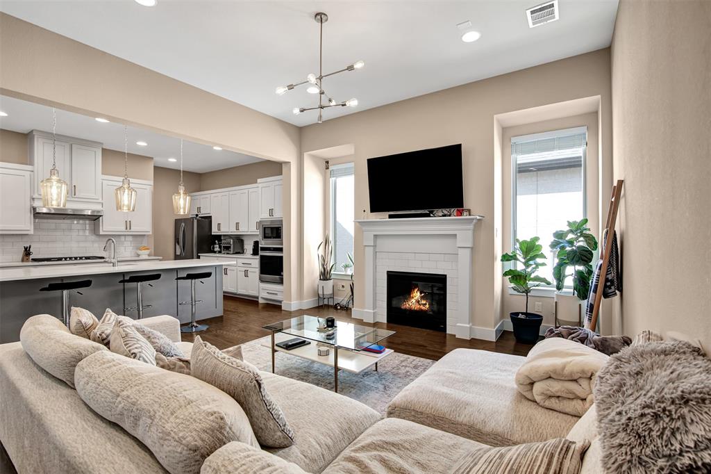 1026 Billy Lane Allen, TX 75013 - Photo 6 of 32 a living room with furniture fireplace and flat screen tv