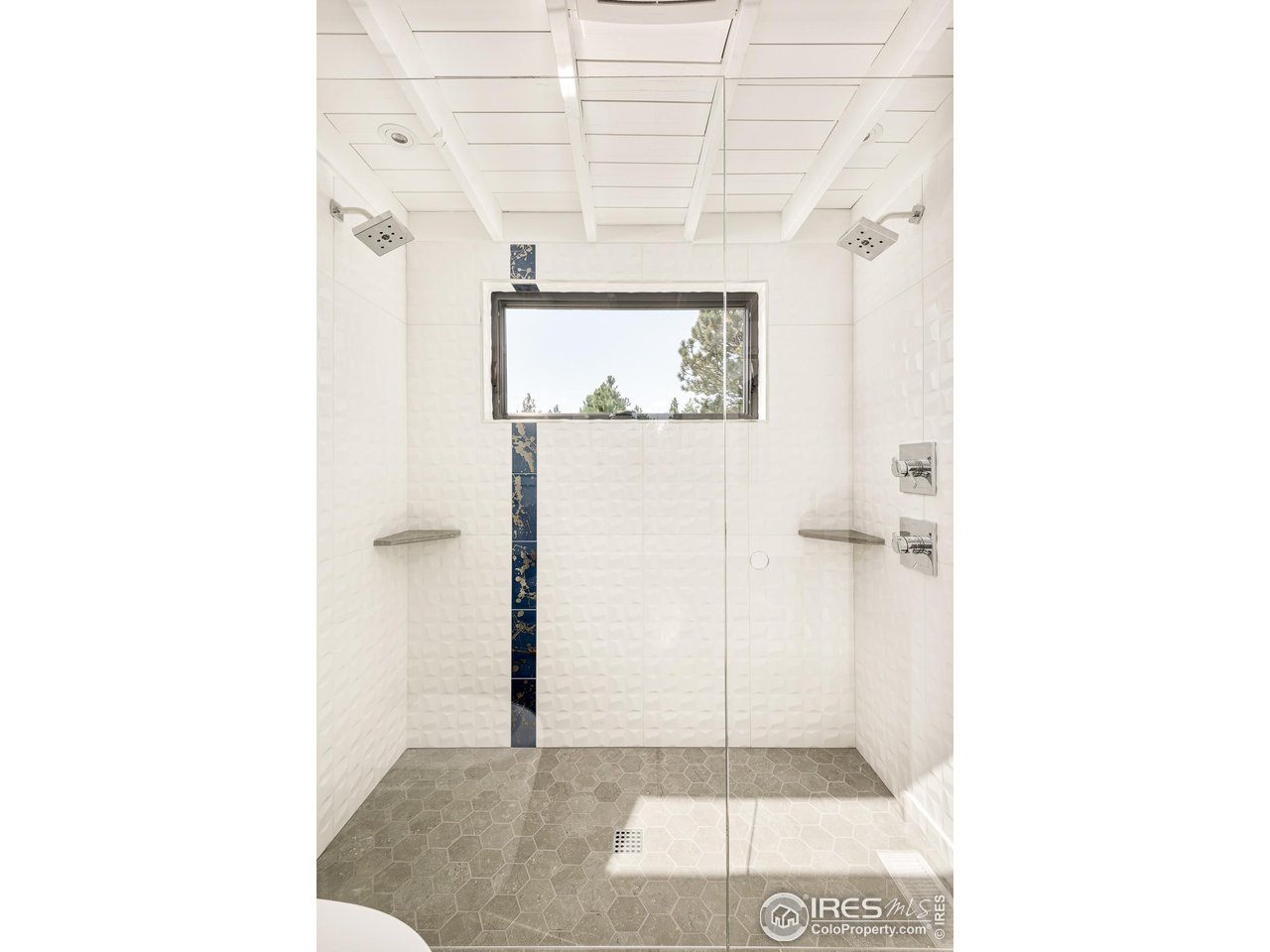 127 Wild Tiger Road Boulder, CO 80302 - Photo 16 of 40 a view of a bathroom with a shower