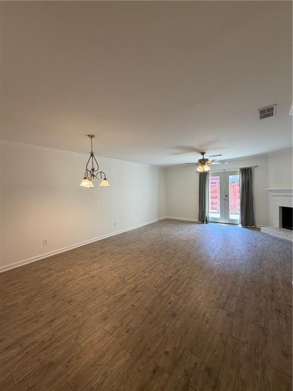 2912 Webb Bridge Road Alpharetta, GA 30009 - Photo 3 of 12 a view of empty room with window and fireplace
