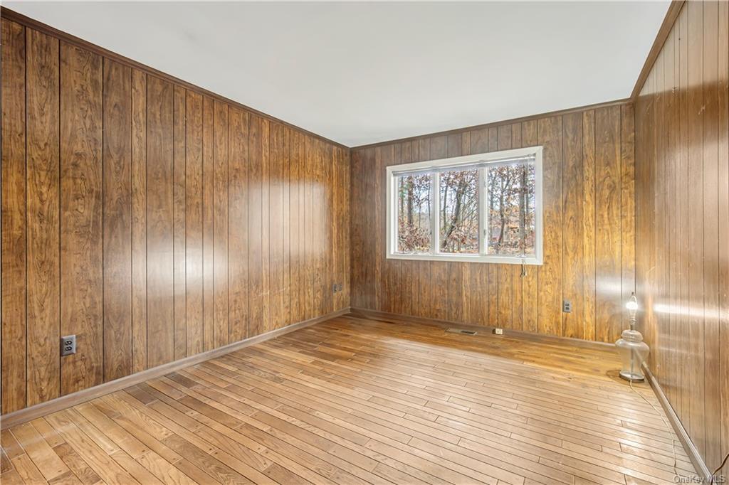 461 East Mountain Road North Cold Spring, NY 10516 - Photo 15 of 29 a view of an empty room with wooden floor