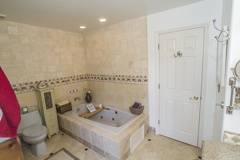 223 Ridge Road Woodside, CA 94062 - Photo 18 of 27 a bathroom with a sink and a toilet