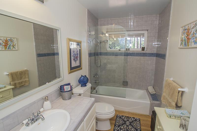 223 Ridge Road Woodside, CA 94062 - Photo 21 of 27 a bath room with a toilet a sink and a bath tub