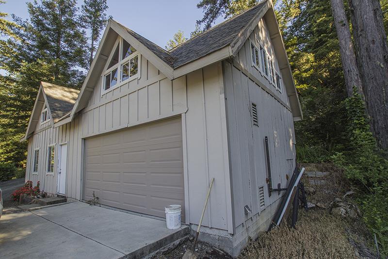 223 Ridge Road Woodside, CA 94062 - Photo 26 of 27 a front view of a house with garage