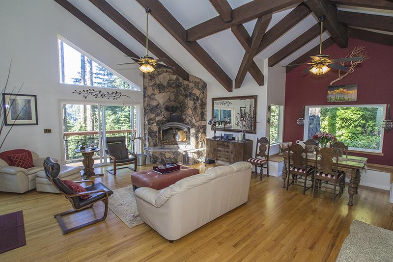 223 Ridge Road Woodside, CA 94062 - Photo 6 of 27 a living room with furniture and a fireplace