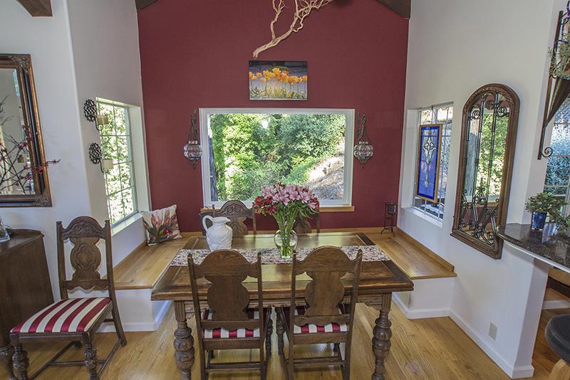 223 Ridge Road Woodside, CA 94062 - Photo 7 of 27 a view of a dining room with furniture window and wooden floor