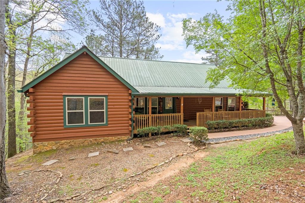285 Julep Circle Ellijay, GA 30540 - Photo 1 of 1 a front view of a house with a yard
