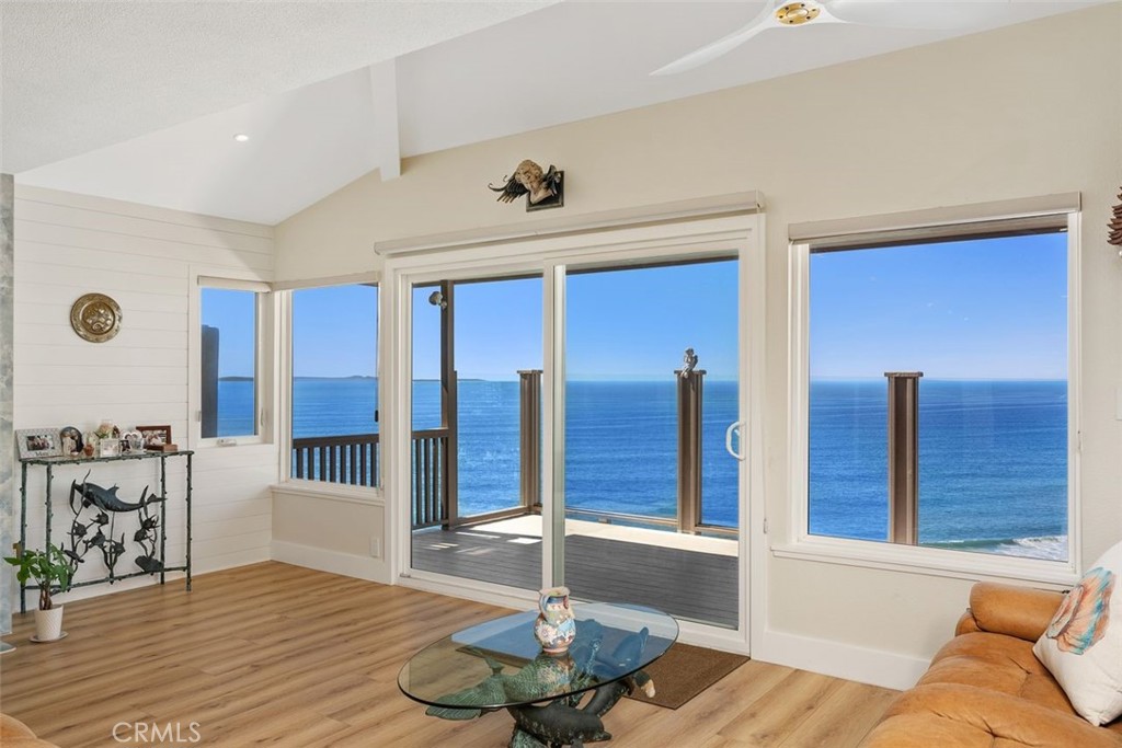 34381 Dana Strand Road Dana Point, CA 92629 - Photo 25 of 68 a living room with furniture and a wooden floor