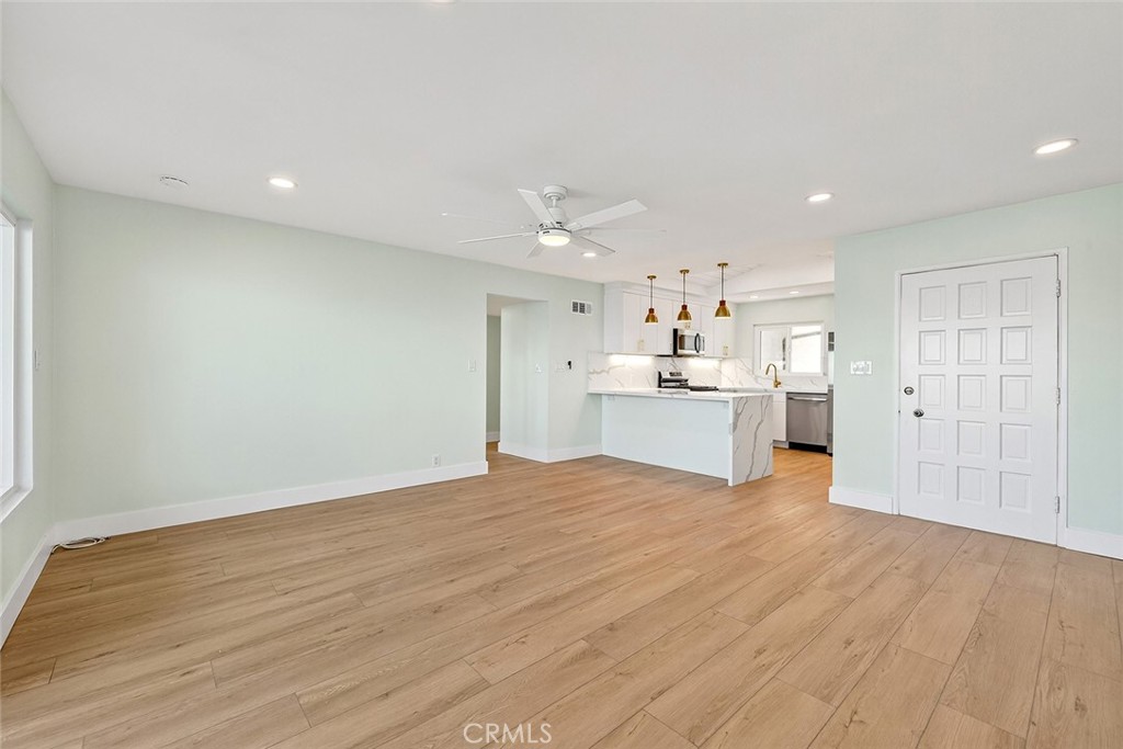 34381 Dana Strand Road Dana Point, CA 92629 - Photo 49 of 68 a view of a kitchen with wooden floor and a sink