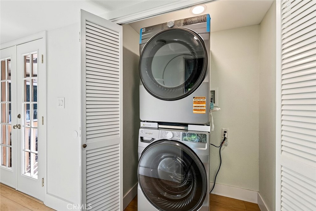 34381 Dana Strand Road Dana Point, CA 92629 - Photo 58 of 68 a view of a hallway with washer and dryer