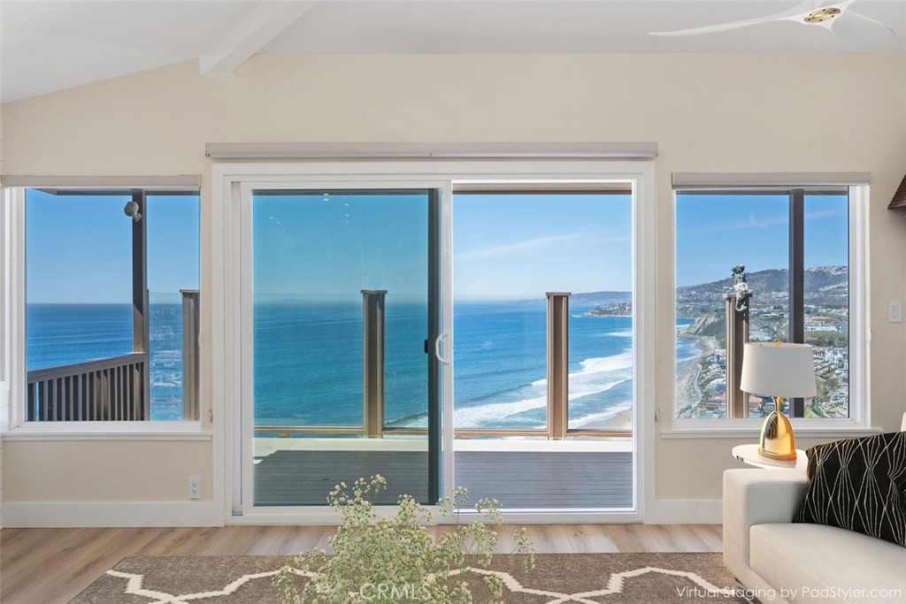 34381 Dana Strand Road Dana Point, CA 92629 - Photo 7 of 68 a living room with furniture and large windows