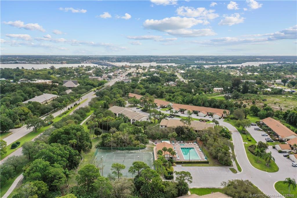 1544 Southwest Silver Pine Way, Unit 104F Palm City, FL 34990 - Photo 37 of 49 an aerial view of multiple house