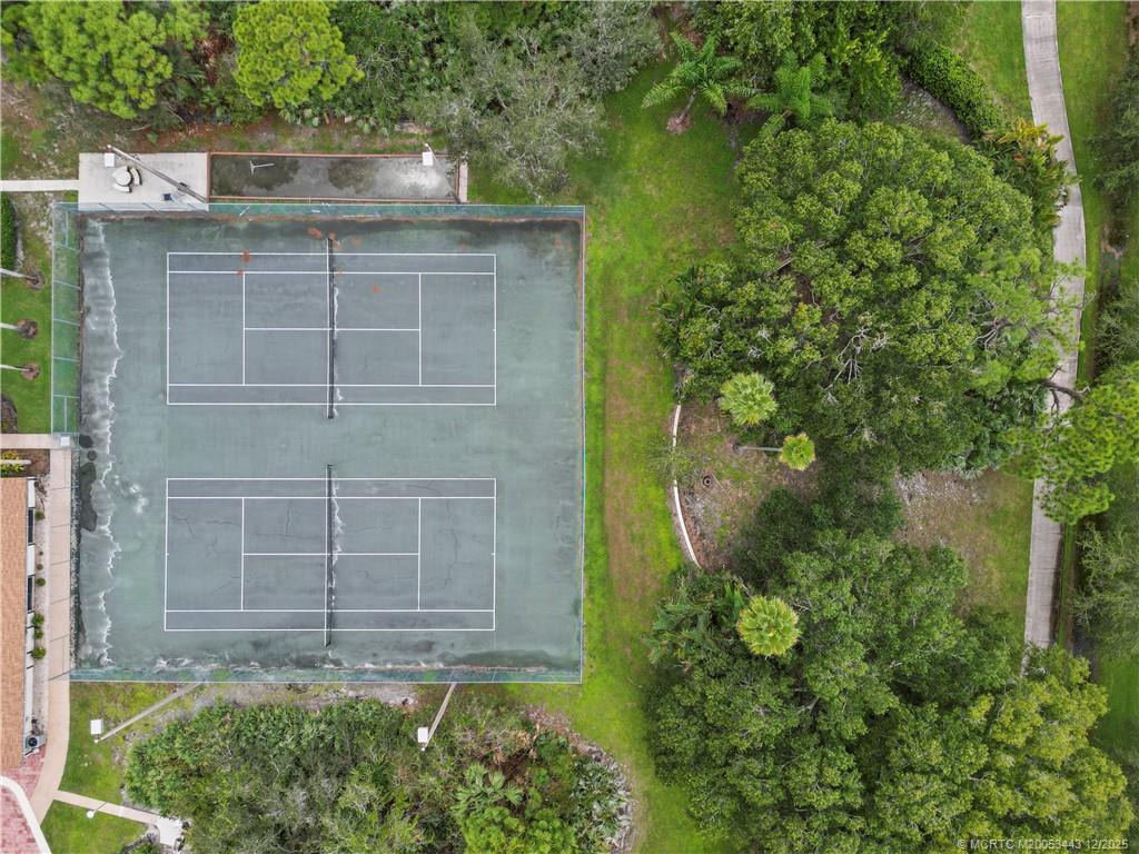 1544 Southwest Silver Pine Way, Unit 104F Palm City, FL 34990 - Photo 39 of 49 a house view with a outdoor space