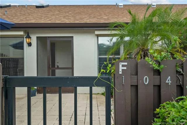 a house view with a garden space