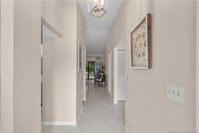 a view of livingroom with furniture and workspace