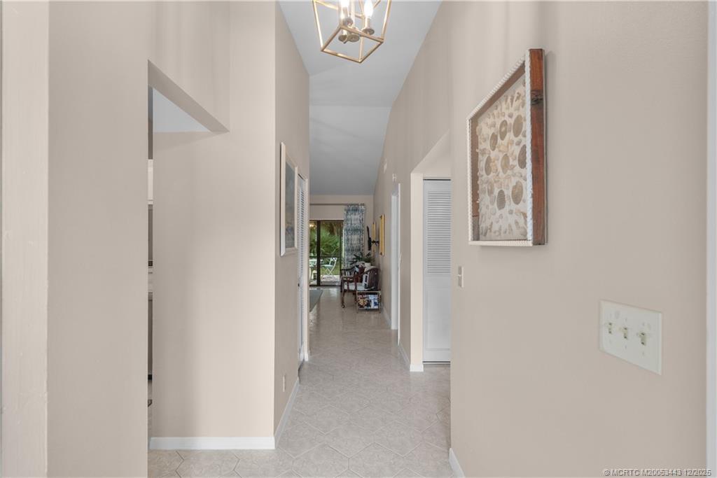 1544 Southwest Silver Pine Way, Unit 104F Palm City, FL 34990 - Photo 9 of 49 a view of livingroom with furniture and workspace