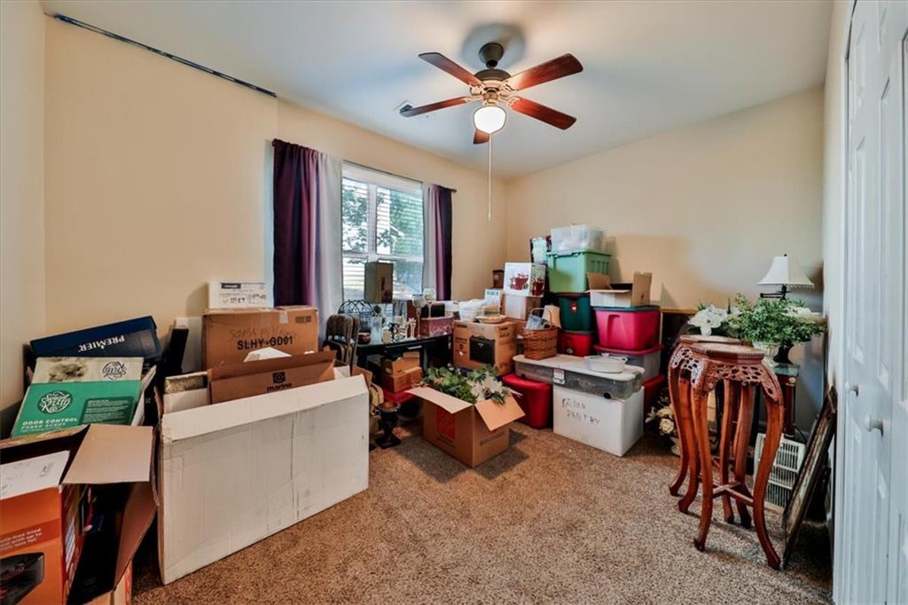 176 Oakland Way Dallas, GA 30157 - Photo 13 of 74 a living room with furniture and a large window