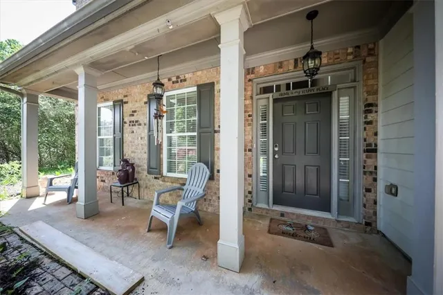 a living room with furniture and a couch