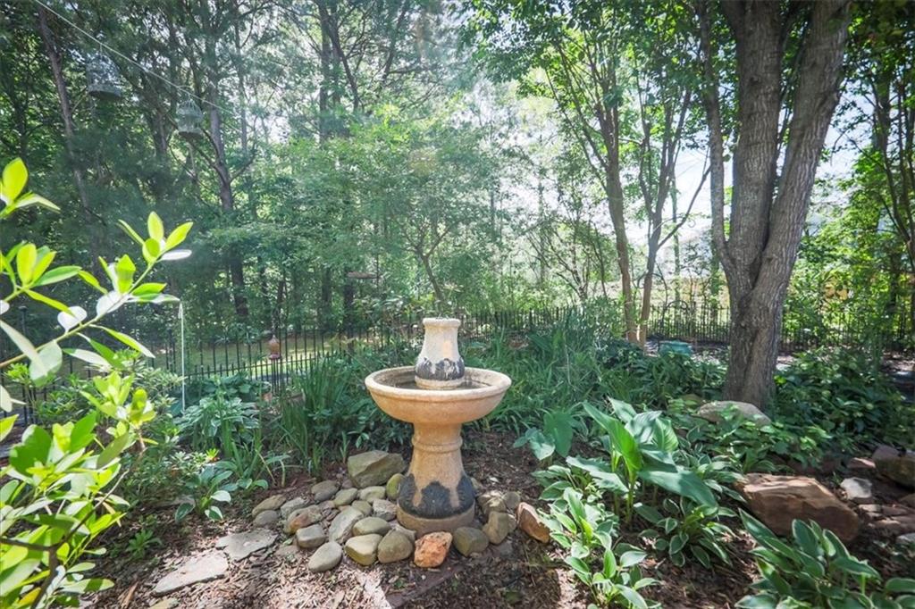 176 Oakland Way Dallas, GA 30157 - Photo 60 of 74 a view of a bench in a garden
