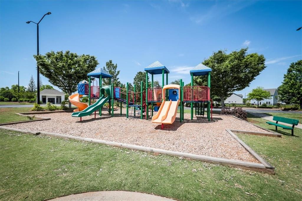 176 Oakland Way Dallas, GA 30157 - Photo 69 of 74 a view of a park with swings