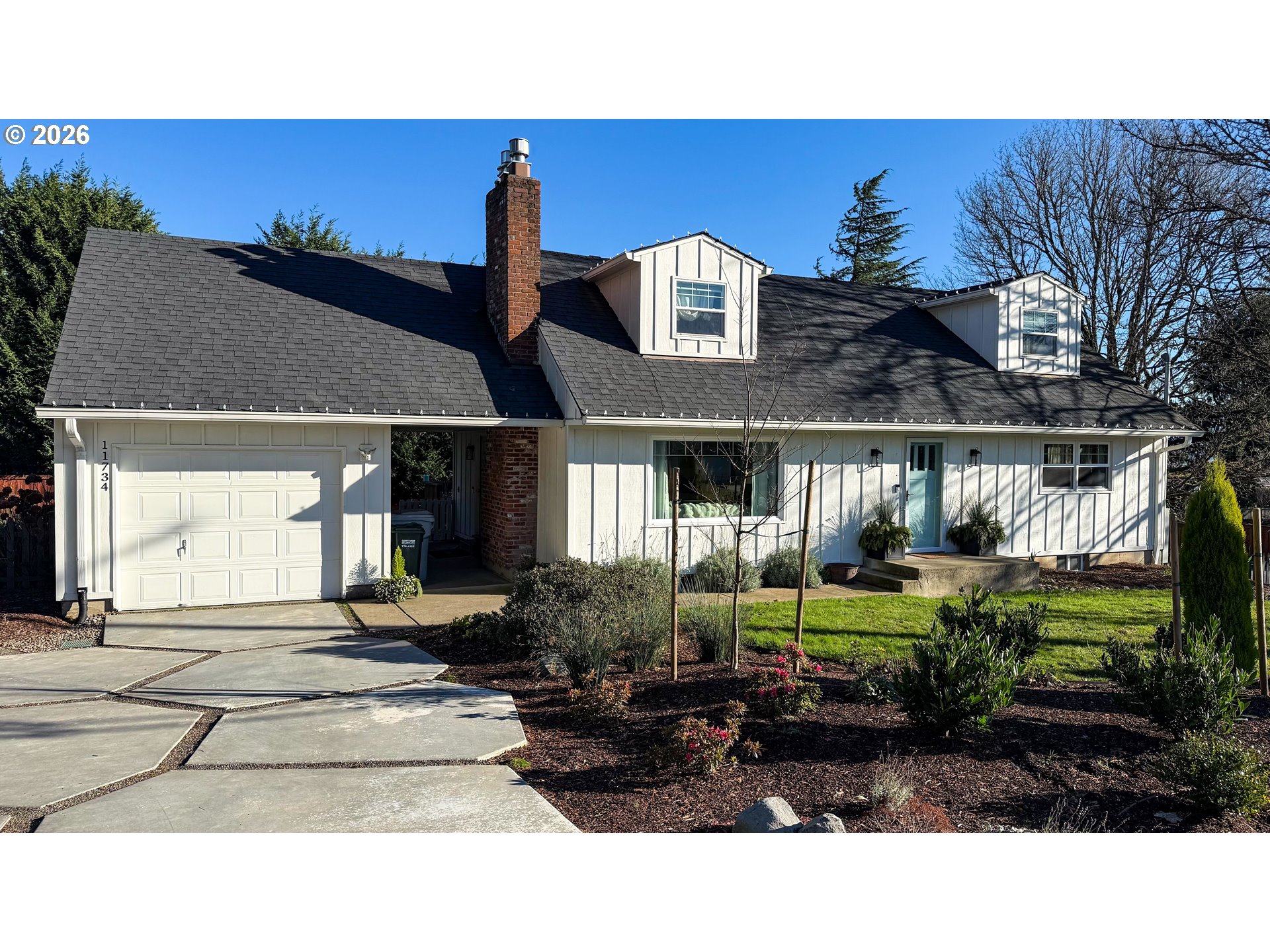 a black and white photo of a house