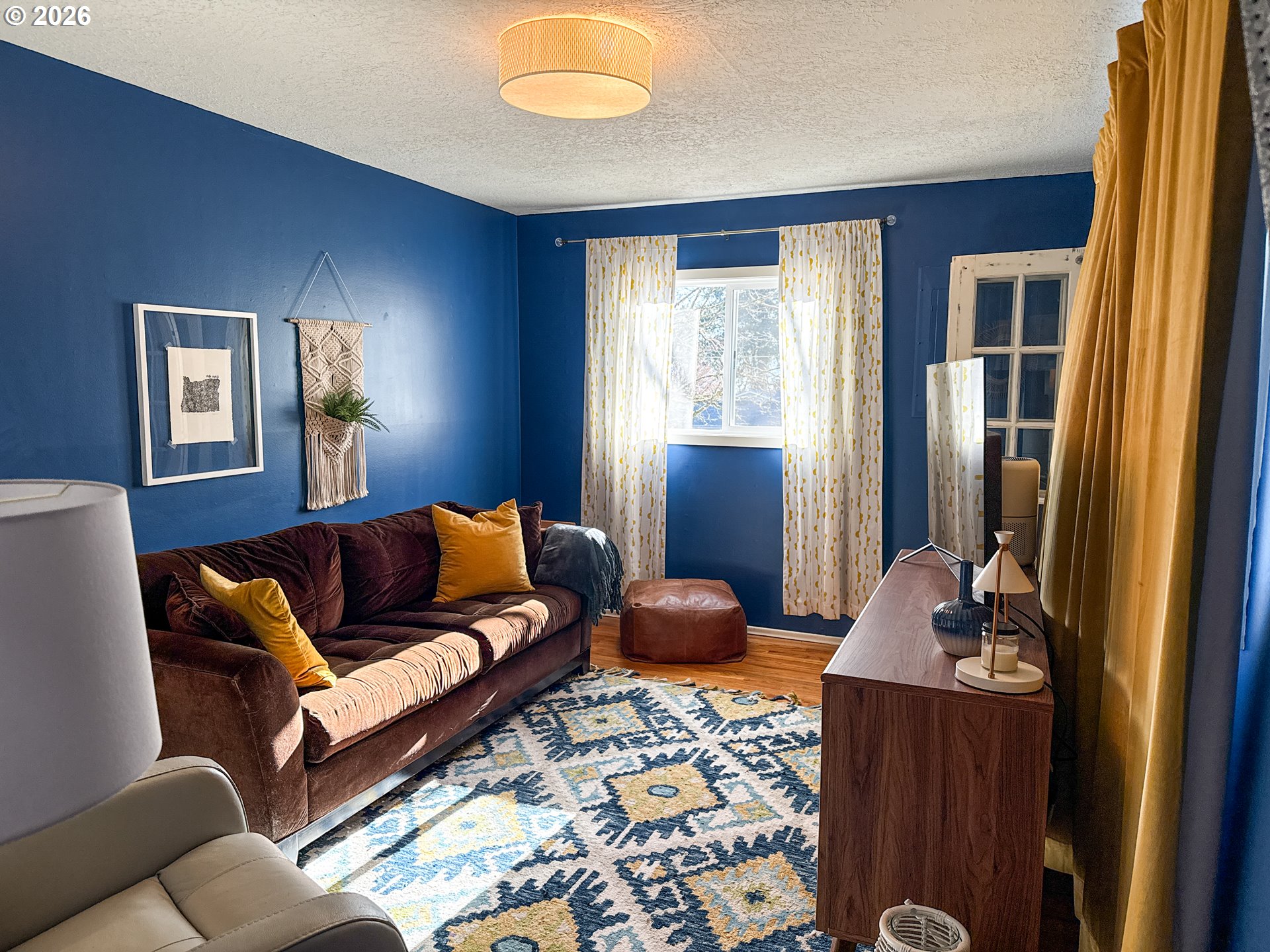 11734 Southeast Idleman Road Happy Valley, OR 97086 - Photo 20 of 48 a living room with furniture and a window