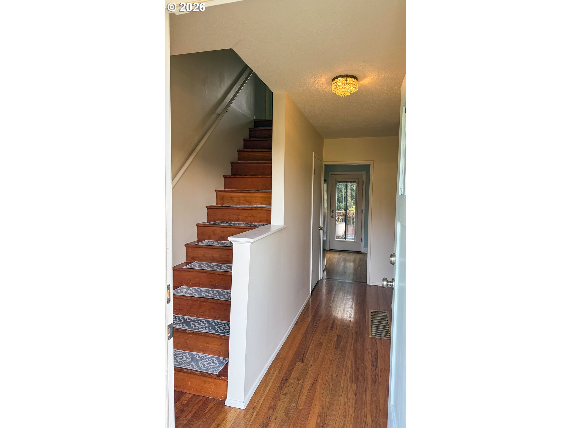 11734 Southeast Idleman Road Happy Valley, OR 97086 - Photo 22 of 48 a view of a hallway with staircase