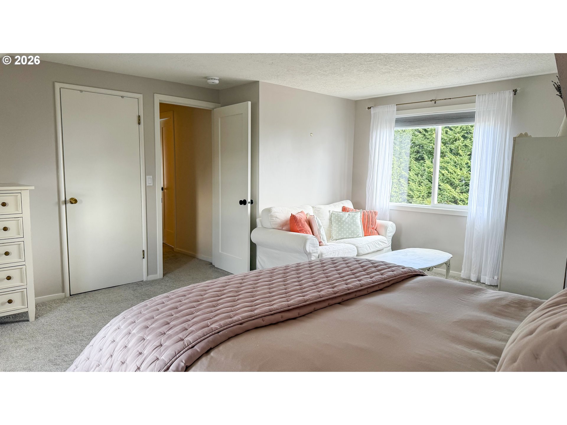 11734 Southeast Idleman Road Happy Valley, OR 97086 - Photo 33 of 48 a bedroom with a bed and window