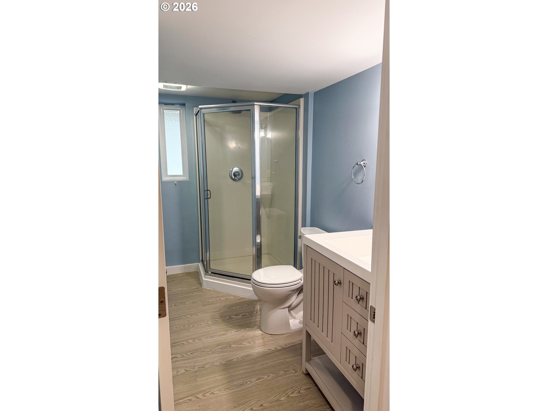11734 Southeast Idleman Road Happy Valley, OR 97086 - Photo 36 of 48 a bathroom with a granite countertop toilet a sink and a mirror