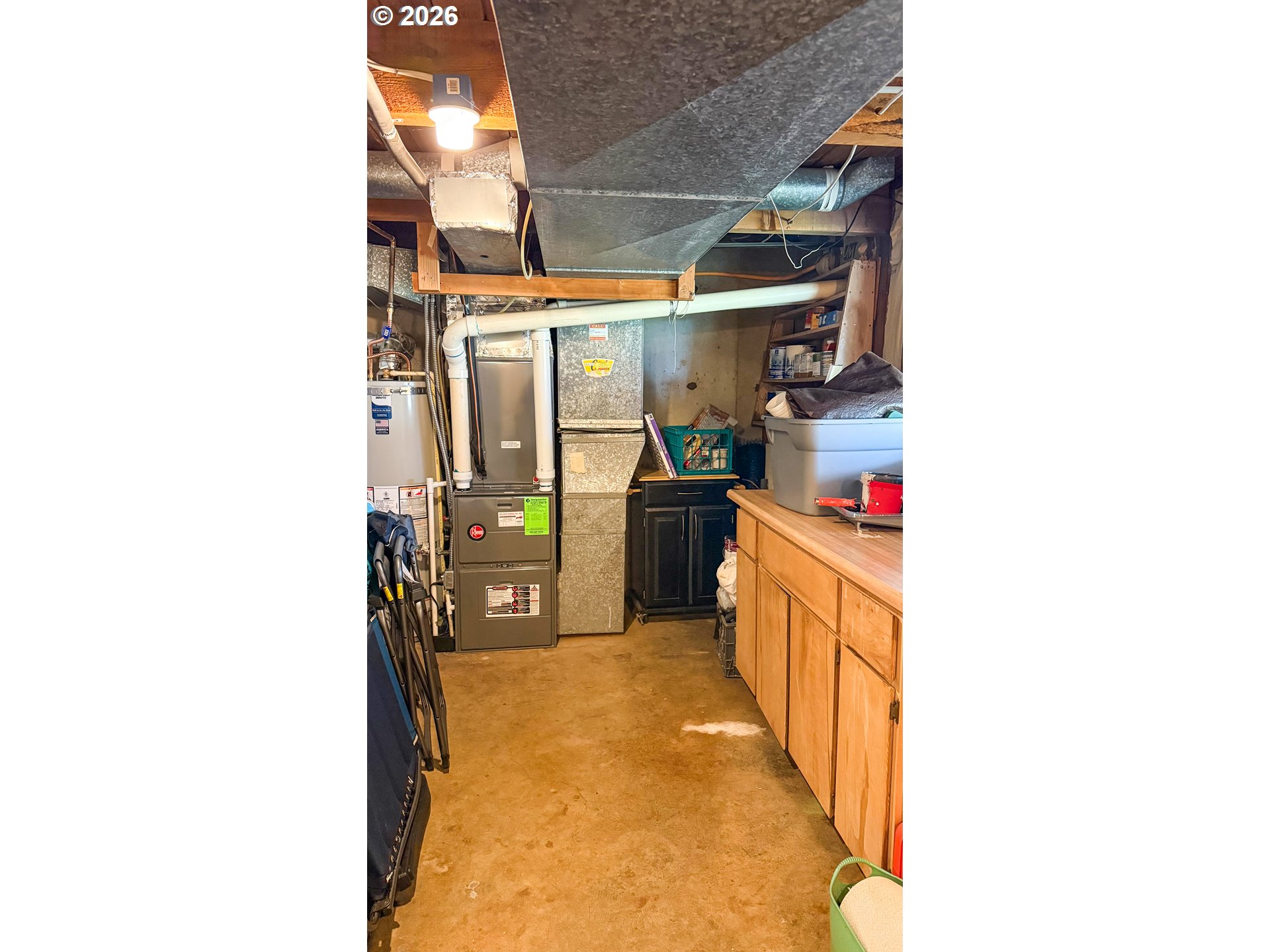 11734 Southeast Idleman Road Happy Valley, OR 97086 - Photo 40 of 48 a hallway with a white cabinets