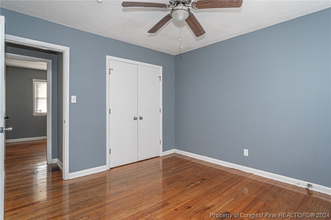 214 Lansdowne Road Fayetteville, NC 28314 - Photo 11 of 22 a view of room with hardwood floor and ceiling fan