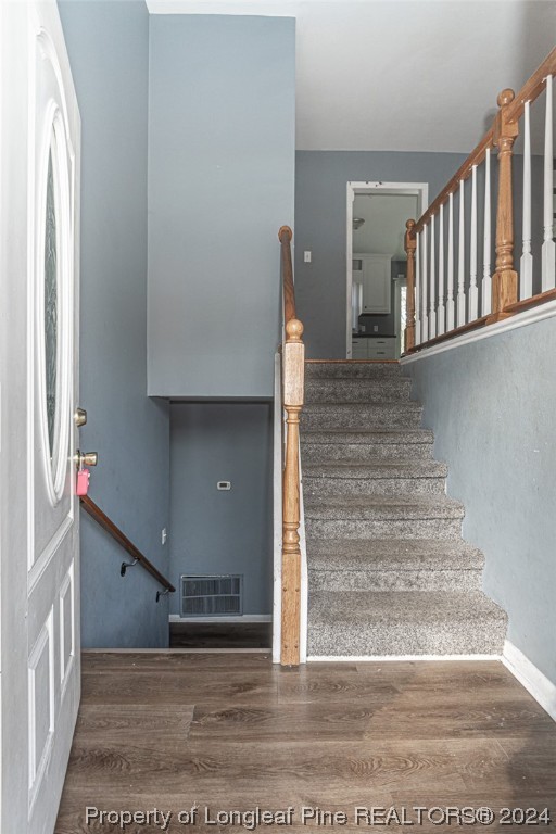 214 Lansdowne Road Fayetteville, NC 28314 - Photo 2 of 22 a view of entryway and hall with wooden floor