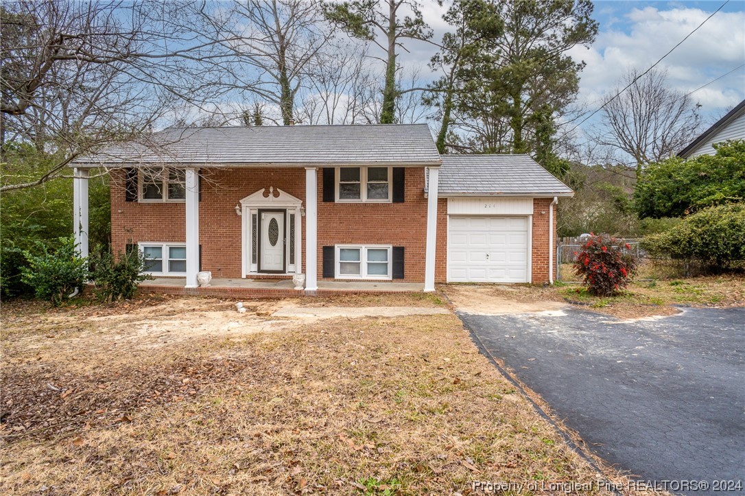 214 Lansdowne Road Fayetteville, NC 28314 - Photo 21 of 22 front view of a house with a yard