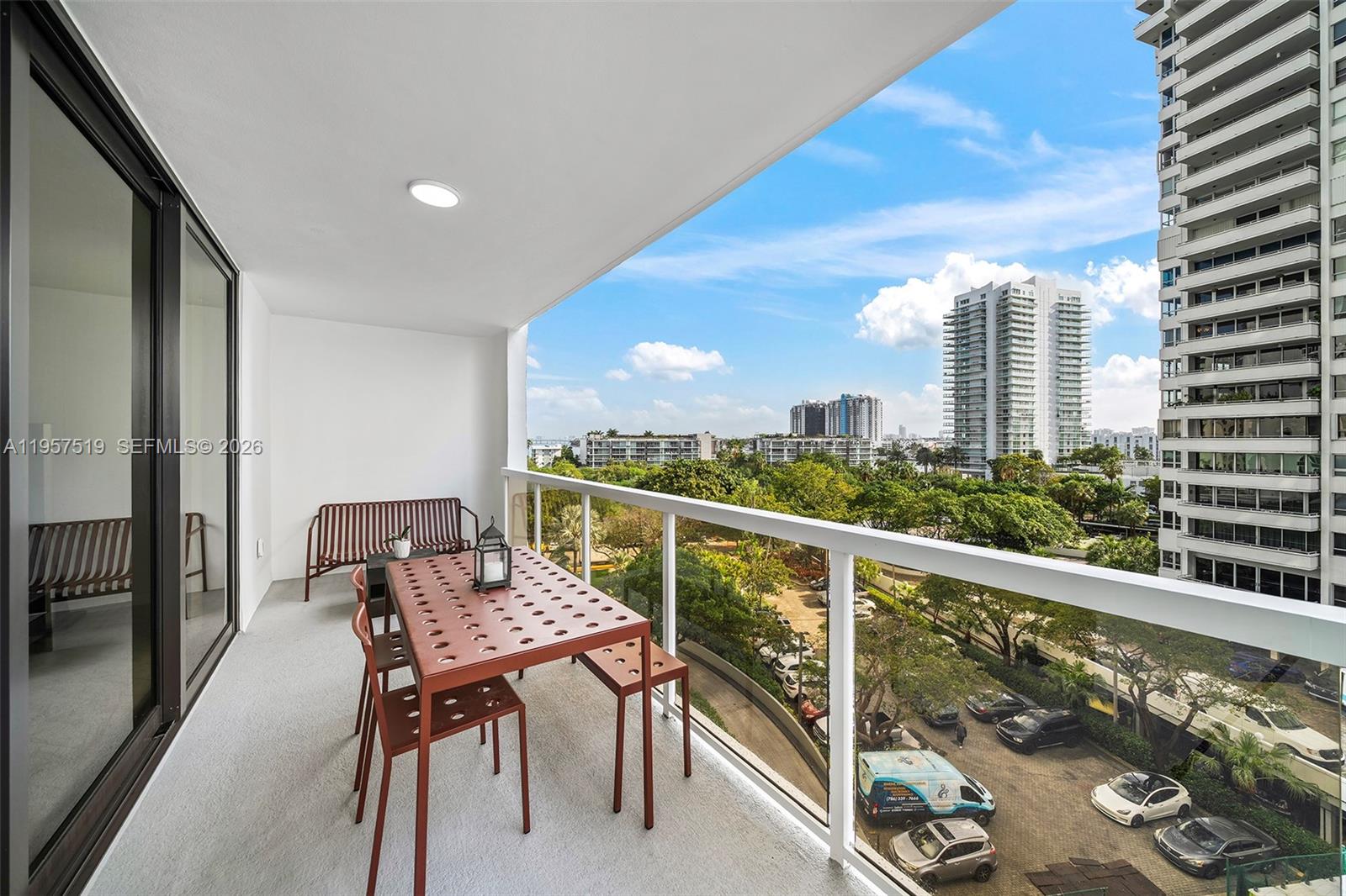 9 Island Avenue, Unit 710 Miami Beach, FL 33139 - Photo 14 of 15 a view of a balcony with furniture