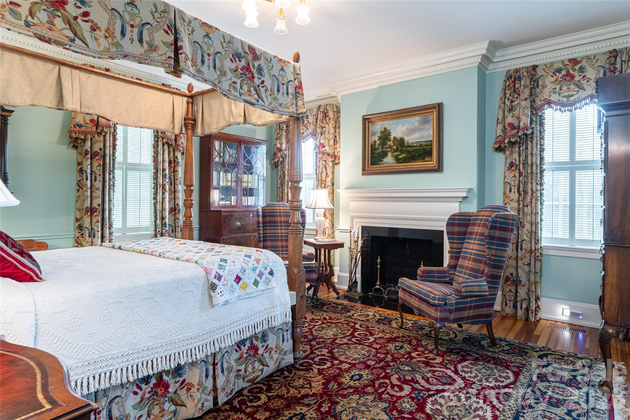 324 Vanderbilt Road Asheville, NC 28803 - Photo 24 of 48 a bedroom with a bed next to a window with a fireplace