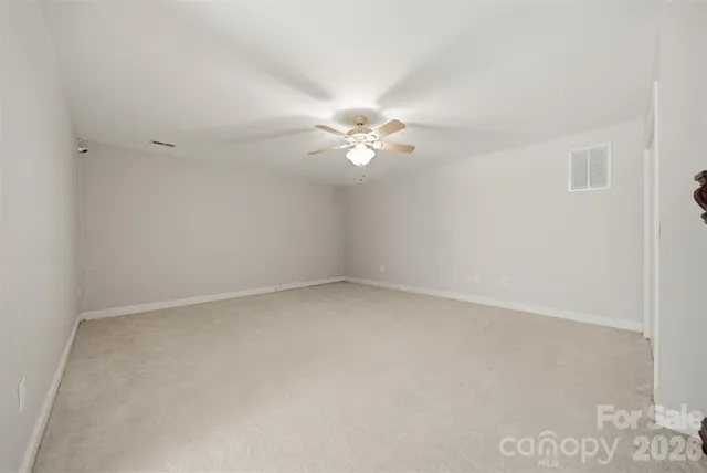 a view of a hallway with closet