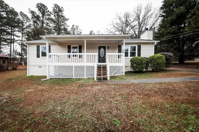 front view of a house with a yard