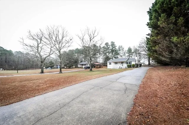 a view of road with with trees