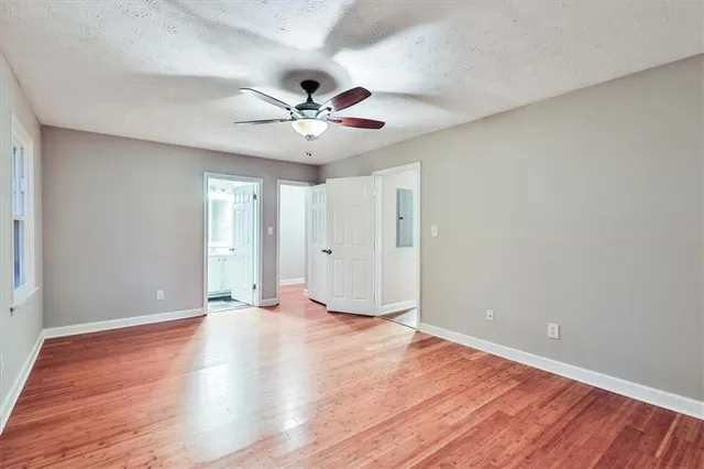 a view of a small space with wooden floor